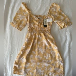 Yellow dress with white flowers